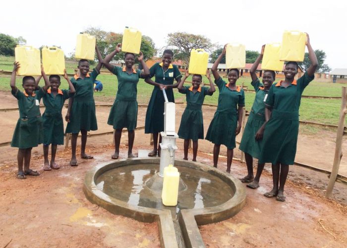 Omarai girls fetching water from their School borehole.
